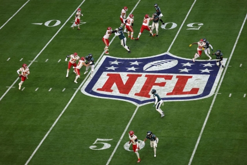 Mahomes rolls out of the pocket on his team's opening drive.
