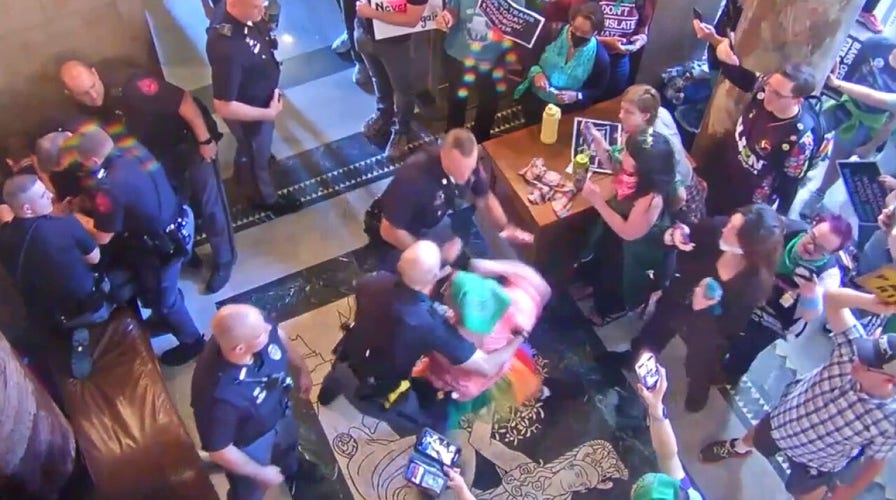 Woman punches Nebraska trooper amid protests over controversial abortion, transgender bill debate