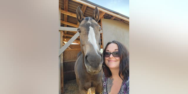  Corinea Stanhope with horse