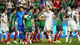 LAS VEGAS, NEVADA - JUNE 15: Walker Zimmerman #3 of USA and Guillermo Ochoa #13 of Mexico break up the scuffle between their teams in the second half during the 2023 CONCACAF Nations League semifinals at Allegiant Stadium on June 15, 2023 in Las Vegas, Nevada. (Photo by Louis Grasse/Getty Images)