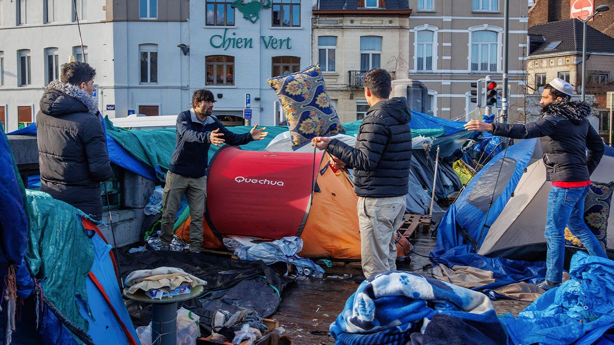 men making tents
