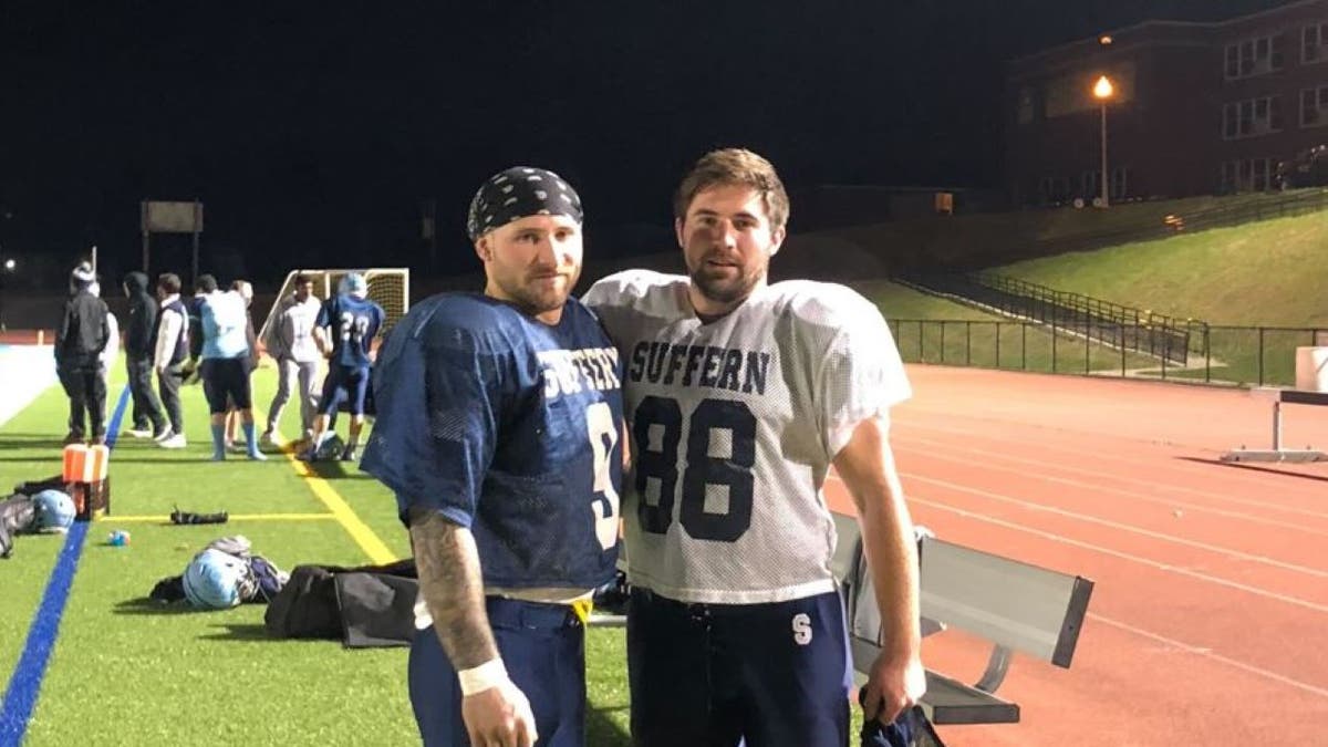 Nick and Doug Kantor in football uniforms on sideline