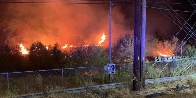 encampment brush fire