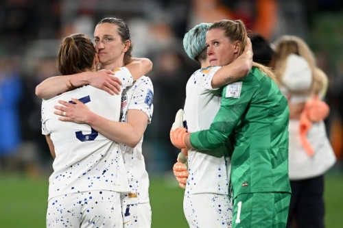 USA players comfort each other after being eliminated during the penalty shootout against Sweden in the FIFA Women's World Cup in Melbourne Sunday, August 6, 2023.