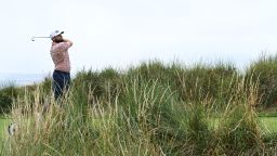 Tyrrell Hatton of England tees off on the 13th hole during Day Three of The 151st Open at Royal Liverpool Golf Club on July 22, 2023 in Hoylake, England. 