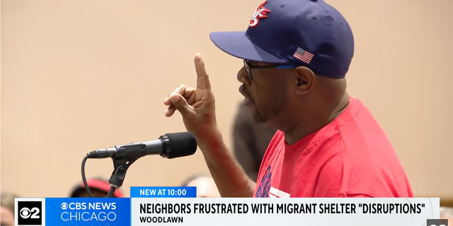 news report screenshot of Woodlawn resident addressing city leaders