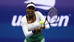 NEW YORK, NEW YORK - SEPTEMBER 01: Venus Williams plays a backhand with partner Serena Williams of the United States against Lucie Hradecka and Linda Noskova of Czech Republic during the Women's Doubles First Round match during their Men's Singles Second Round match on Day Four of the 2022 US Open at USTA Billie Jean King National Tennis Center on September 01, 2022 in the Flushing neighborhood of the Queens borough of New York City. (Photo by Jamie Squire/Getty Images)