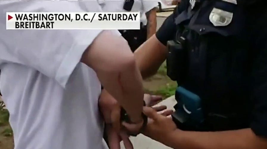 Pro-life activists arrested for writing on sidewalk with chalk	