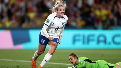 Lauren Hemp celebrates after scoring her team's first goal.