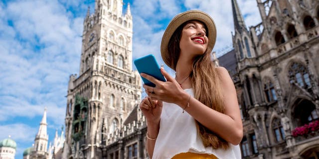 Woman traveling with her phone.