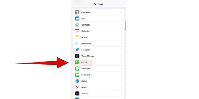 Screenshot of red arrow pointing to the "Phone" option in Settings on an iPhone