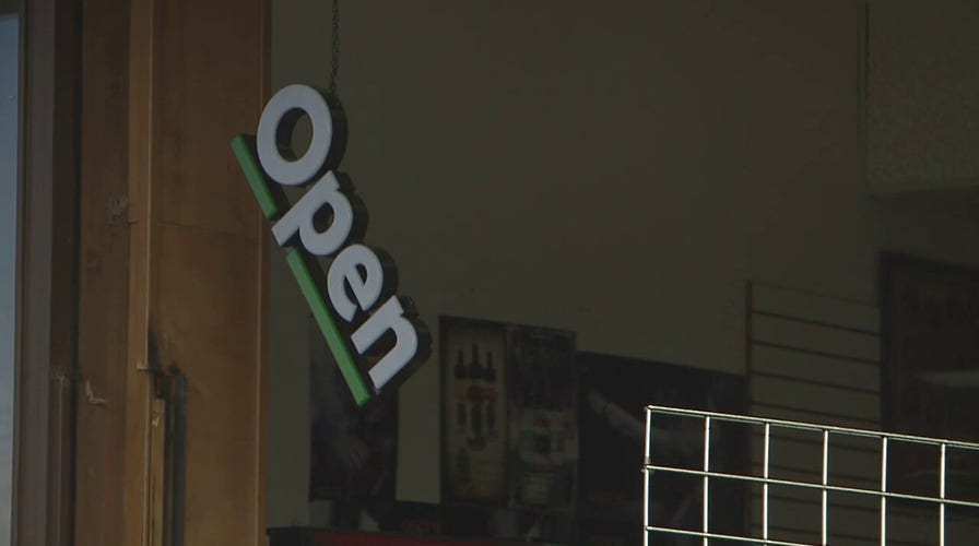 Suspect crashes stolen car into storefront
