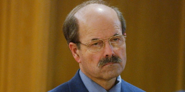 Dennis Rader frowns in court