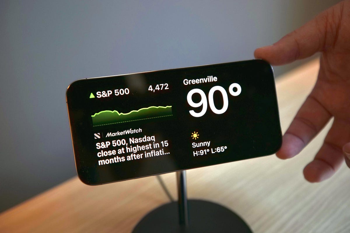 An iPhone with its Standby screen active