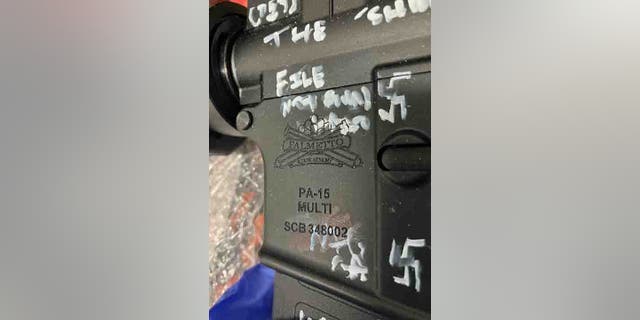 swastikas painted on firearm