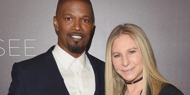 Jamie Foxx and Barbra Streisand walk red carpet for Netflix event