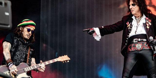Alice Cooper playing with Johnny Depp