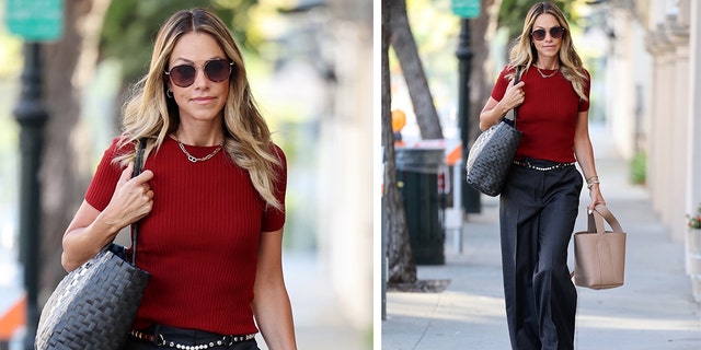 Christine Baumgartner wears red shirt and slacks in divorce meeting from Kevin Costner