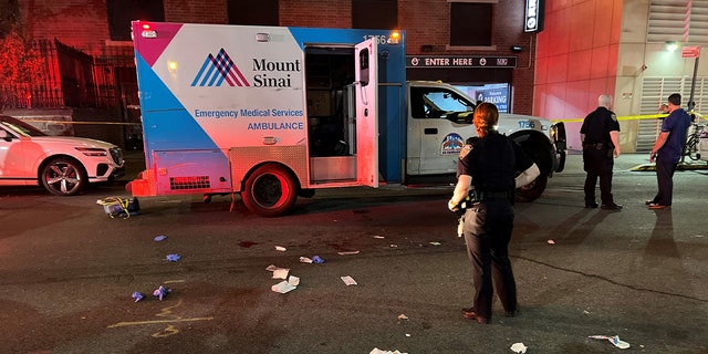 Ambulance parked with door open after EMT stabbed