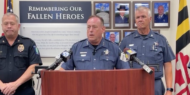 Sheriff Jeff Gahler stands at a podium.