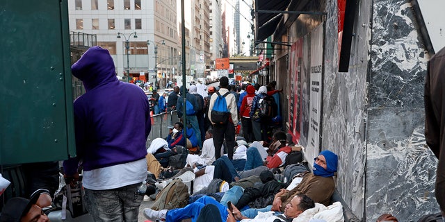 NYC migrants outside Roosevelt Hotel