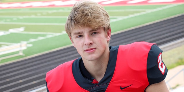 Jordan DeMay wearing a football jersey