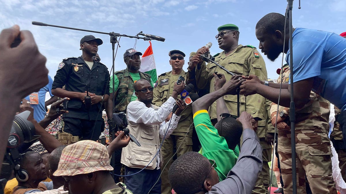 soldier speaks to supporters