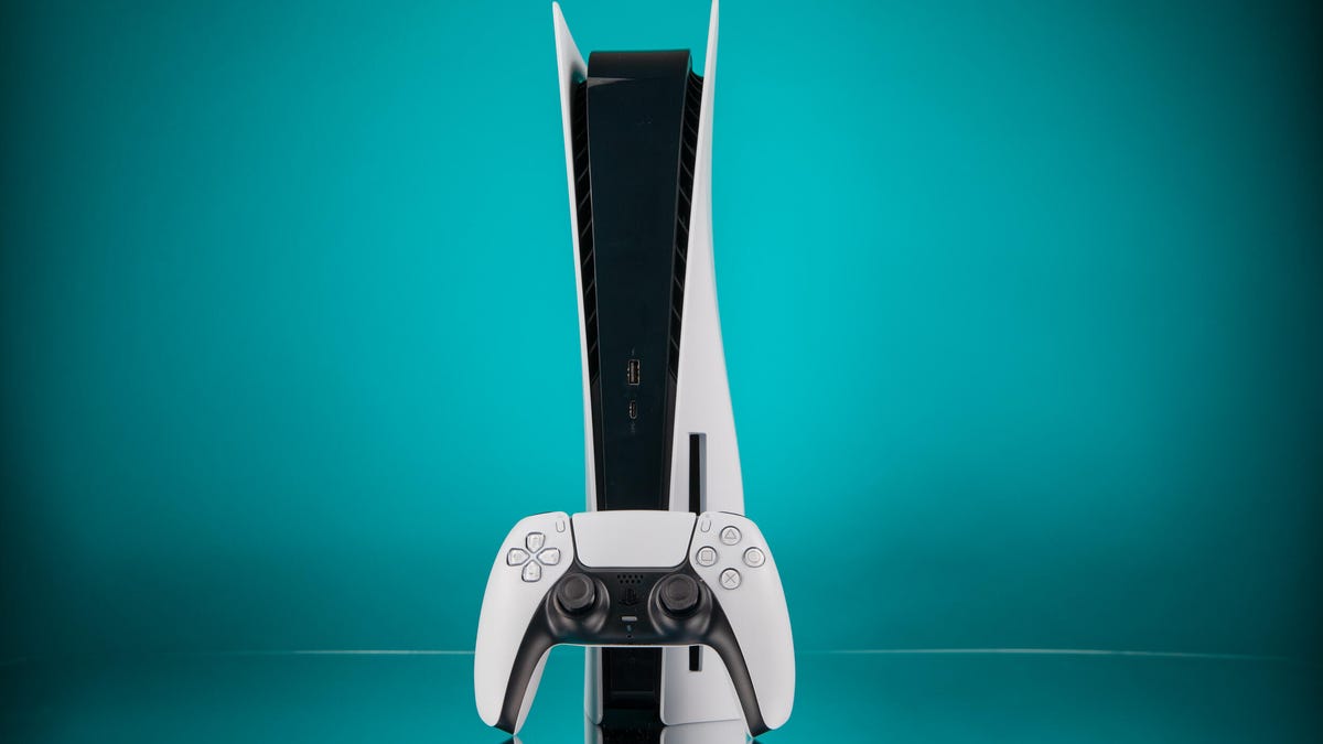 PS5 standing on end and a game controller