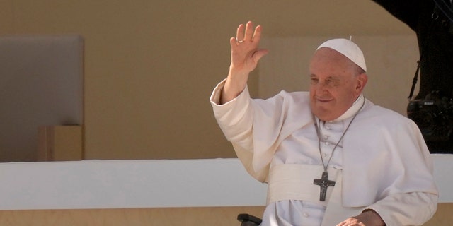 Pope waving