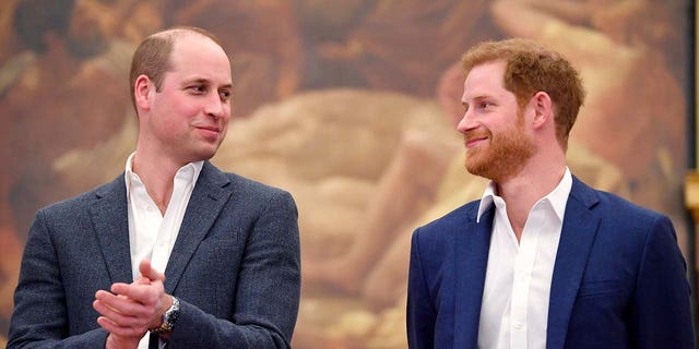 Princes William and Harry looking at each other