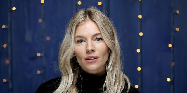 Sienna Miller at a premiere