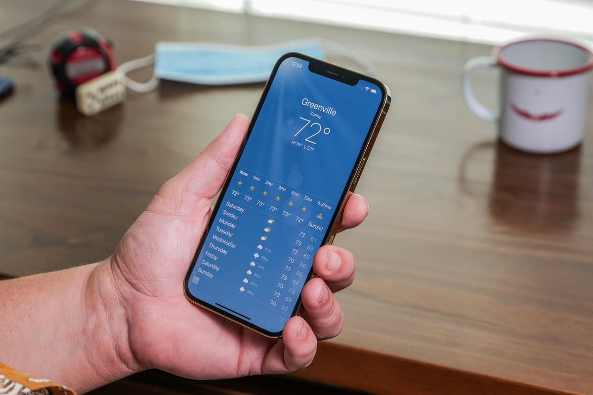 iPhone 12 Pro Max with weather app