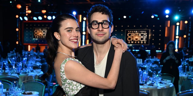 Margaret Qualley and Jack Antonoff hug