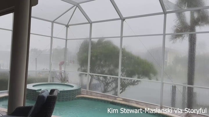 Hurricane Idalia striking through homes