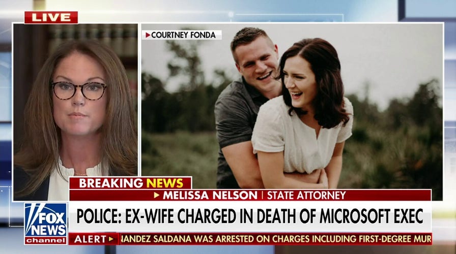 Ex-wife charged in death of Microsoft executive