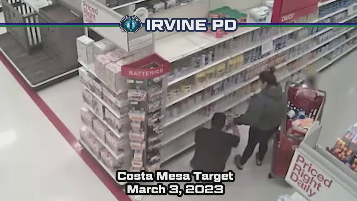 Couple stealing baby formula