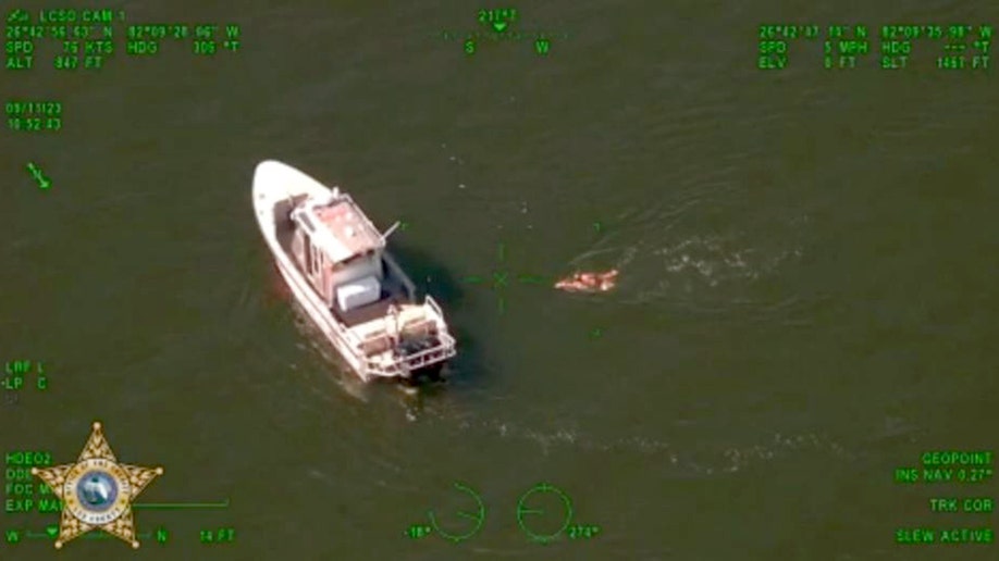 Florida mom swimming to boat