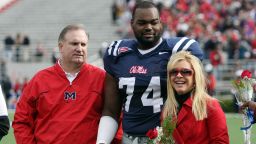 OXFORD, MS - NOVEMBER 28:  Michael Oher #74 of the Ole Miss Rebels stands with his family during senior ceremonies prior to a game against the Mississippi State Bulldogs at Vaught-Hemingway Stadium on November 28, 2008 in Oxford, Mississippi.  (Photo by Matthew Sharpe/Getty Images)