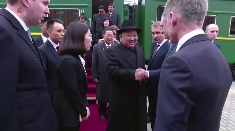 Kim Jong Un riding on his armored train in 2019.