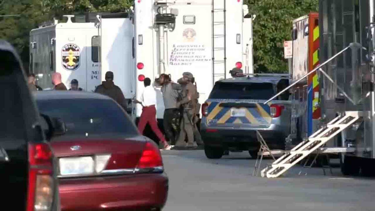 individual handcuffed at shooting scene