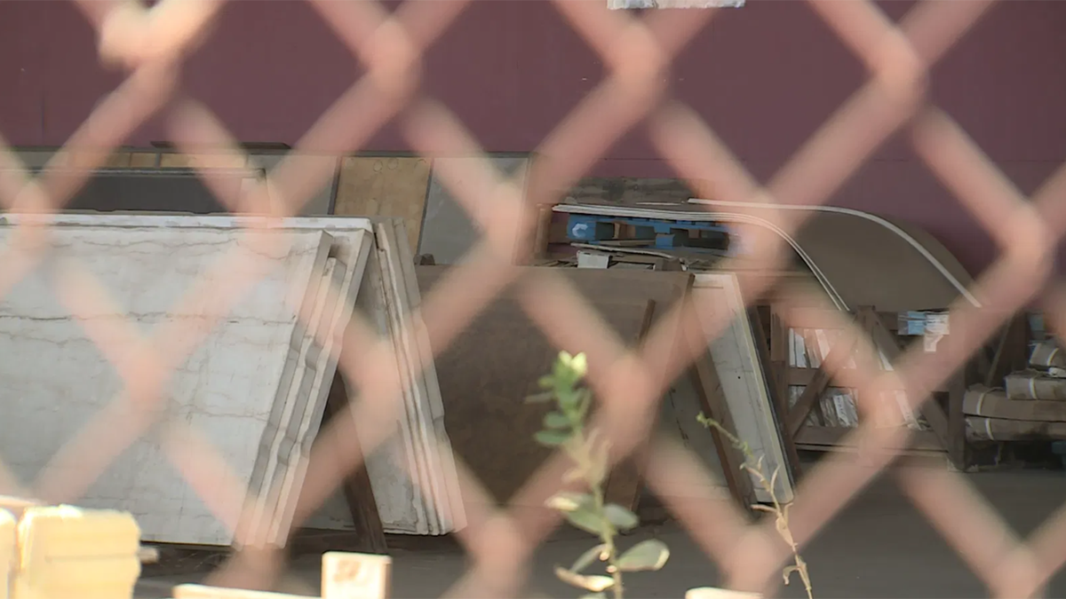 illegal facility in california behind fence