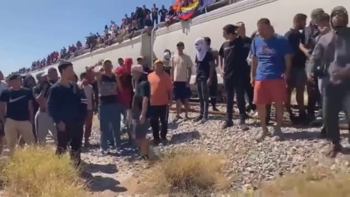 Train carrying migrants stops in Monclova, Mexico
