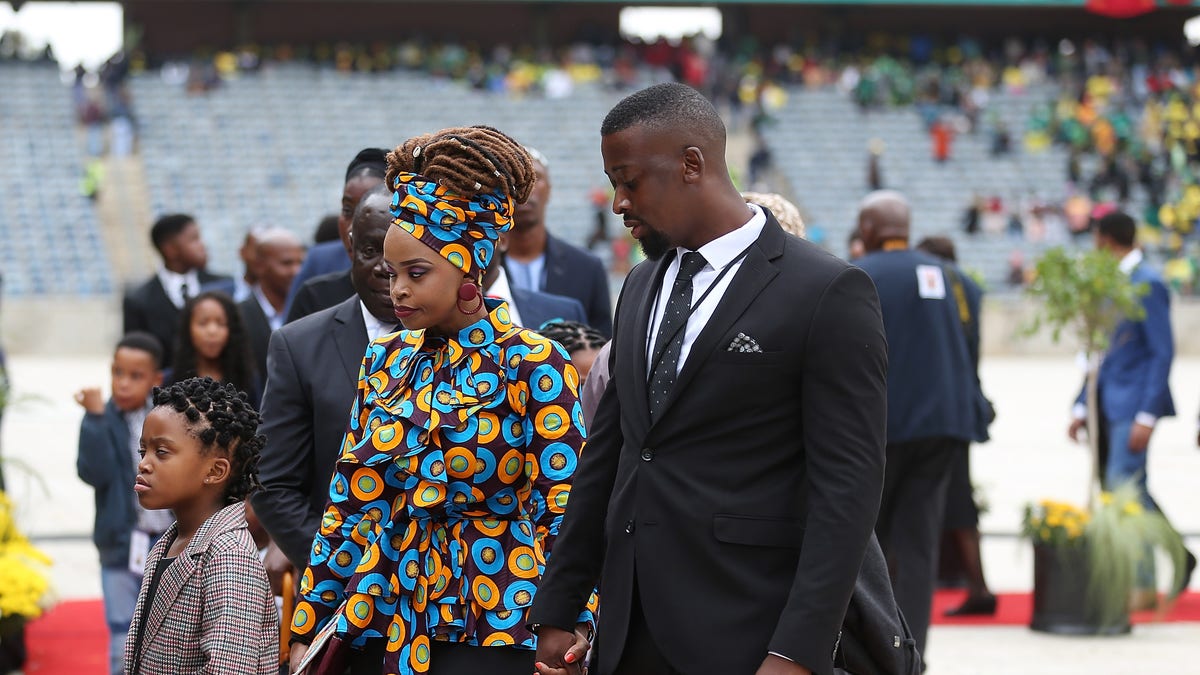 Zoleka Mandela, center, at memorial 