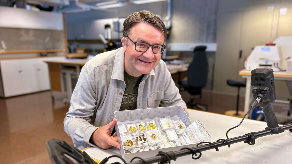 Erlend Bore poses with gold treasure 