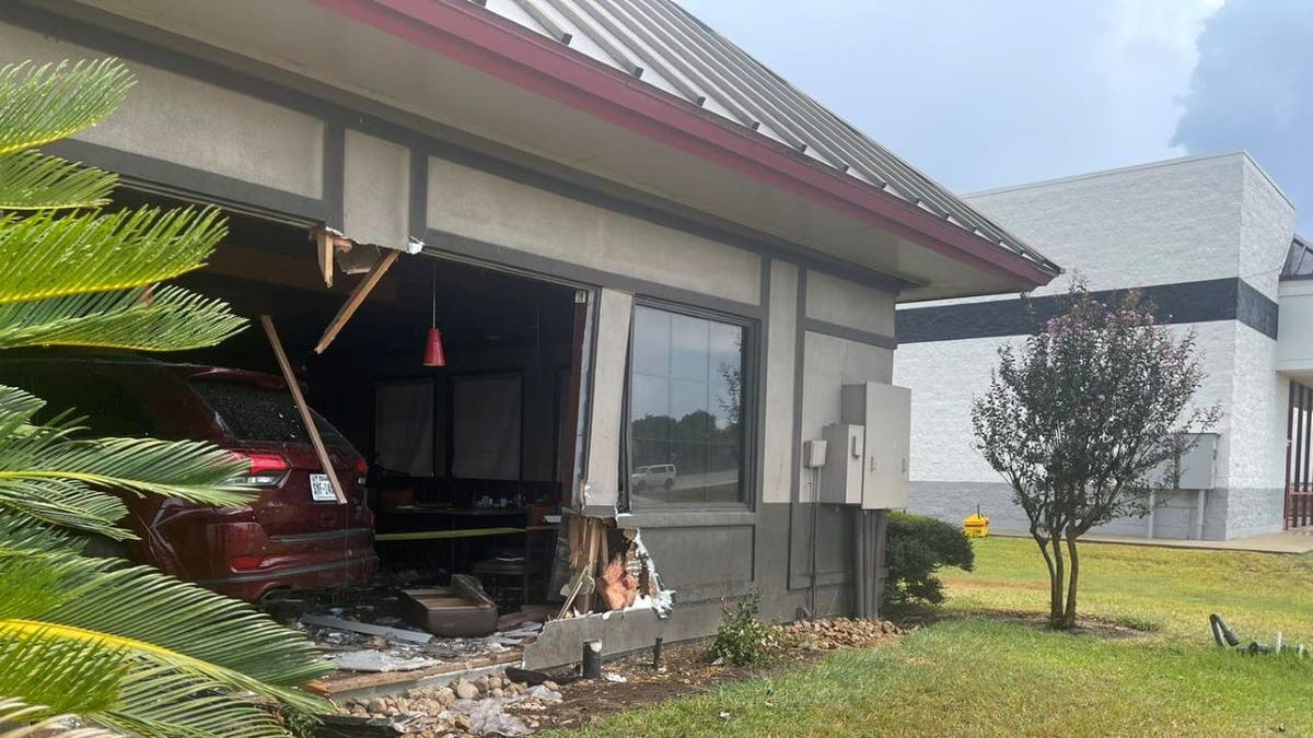 Car crash into Denny's restaurant scene
