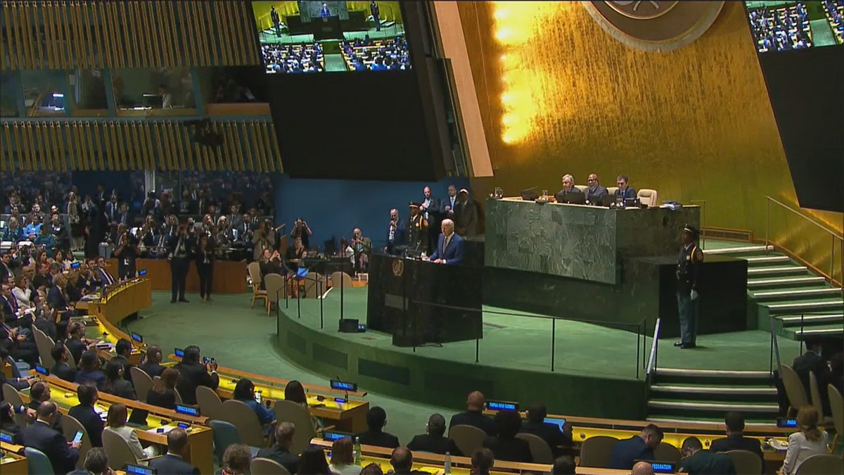 President Biden standing at the podium.