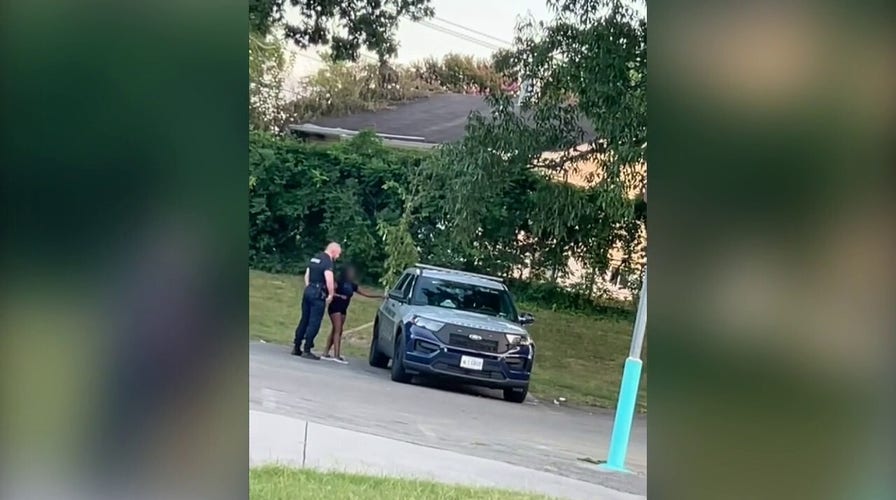 Maryland cop suspended after viral video appears to show him kissing woman, heading into back of patrol car
