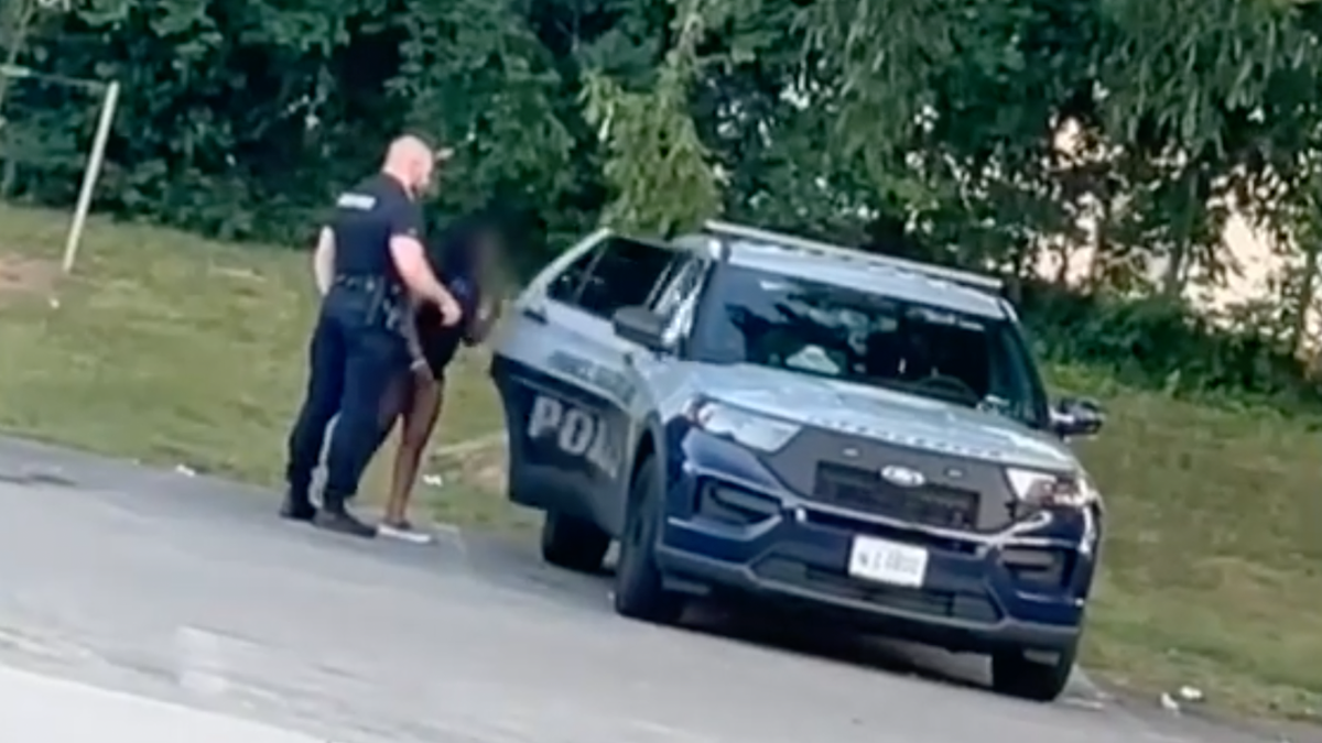 cop and lover entering police cruiser