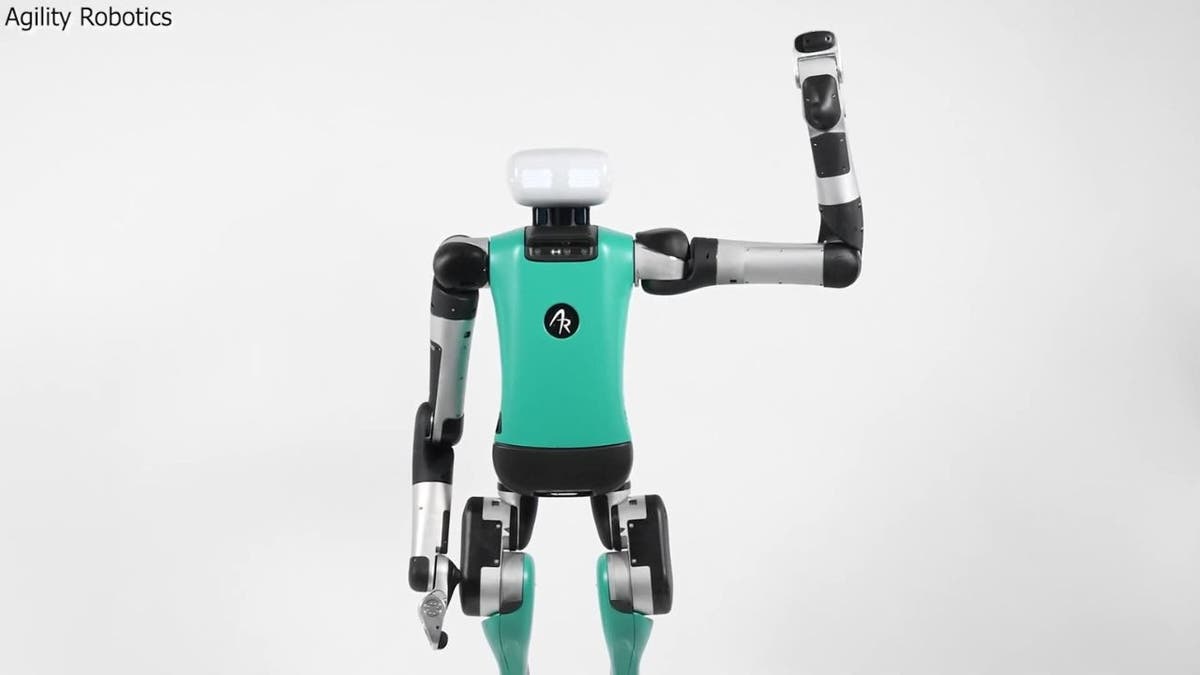Digit the robot waving at the camera.