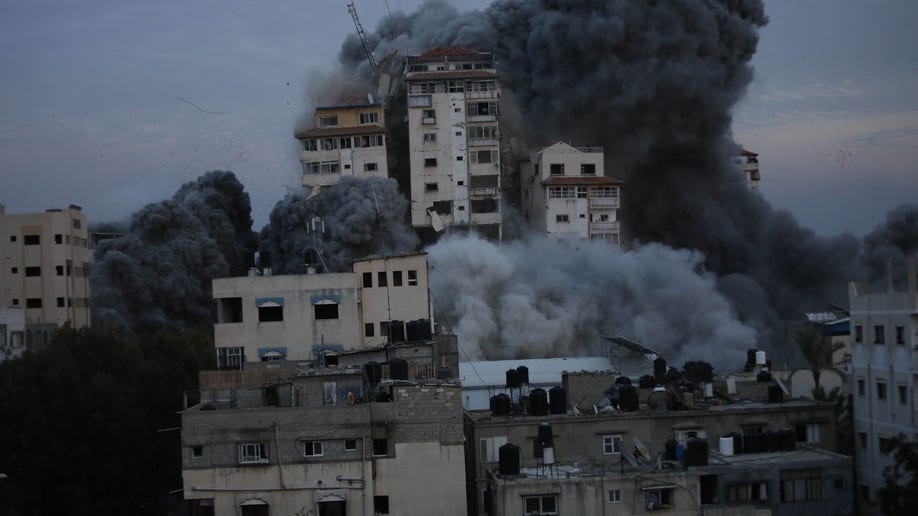heavy smoke from missile attack on building